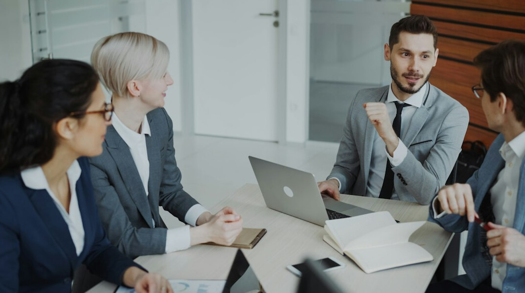 business leader in meeting room